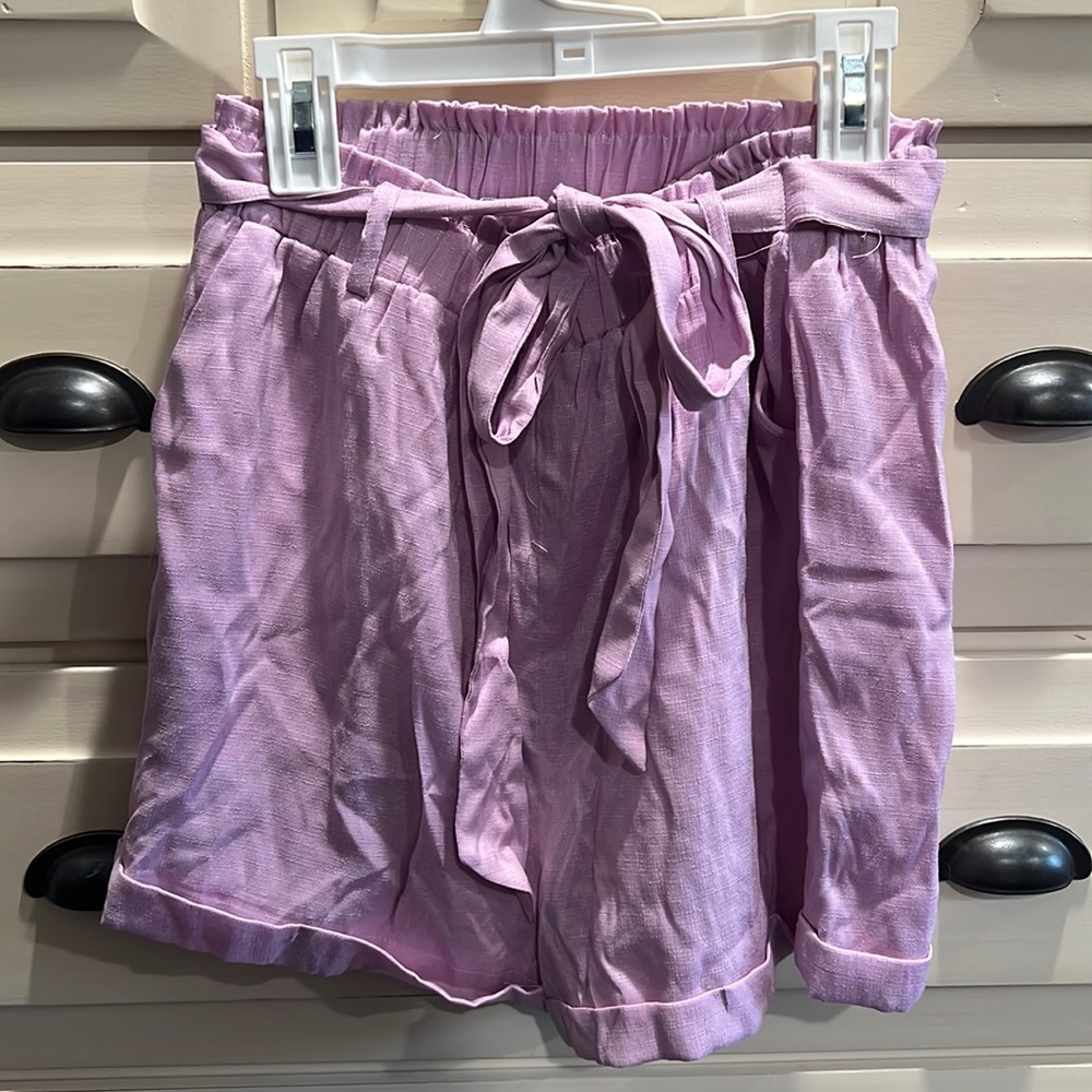 Purple paper bag shorts with a tie wrap waistband